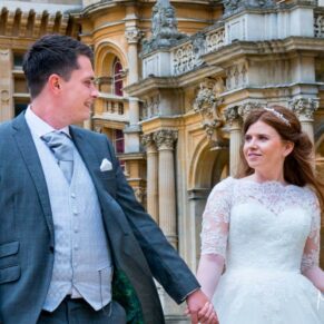 A visit to Waddesdon Manor with the newlyweds produced this striking shot of them walking towards my camera with the historic property behind them