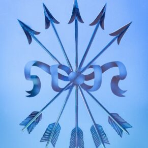 The Five Arrows logo captured in glass at this wedding on the Waddesdon Estate at The Dairy