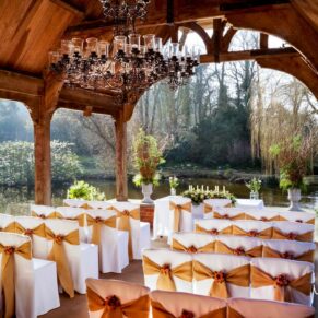 The striking lakeside pavilion setup for a civil ceremony at The Dairy on the Waddesdon Estate