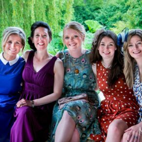 Five smiling ladies sat inside one of the pavilions at The Dairy on a summer's day