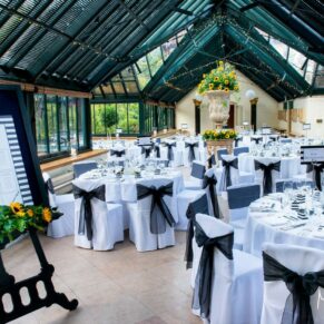 The sensational sunflower bedecked Wintergarden all setup for the wedding breakfast at The Dairy