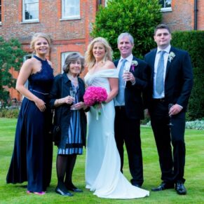 Family group pose in the gardens of this luxury 5 star venue in Watford