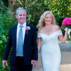 Relaxed stroll for the newlyweds walking through the grounds of the Hertfordshire venue