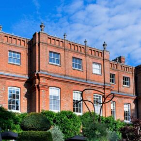 Stunning exterior of the The Grove Hotel in Watford on a sunny day