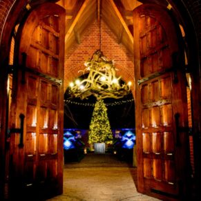 Buckinghamshire events photography of the main lit up entrance at The Dairy at Christmas time