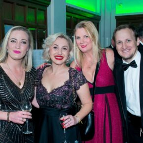 Buckinghamshire events photography of some delegates at a black tie drinks reception