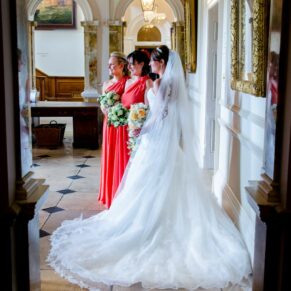 Wokefield Estate Berkshire Wedding Photography - the bride strikes a pose with her bridesmaids