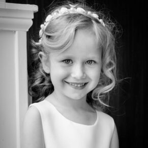 Wokefield Estate Berkshire Wedding Photography - the flower girl captured with stunning windowlight