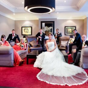 Wokefield Estate Berkshire Wedding Photography - dramatic group pose inside the hotel