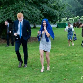 A mad dash across the lawn by these guests to escape the British weather at Saint Michael's Manor