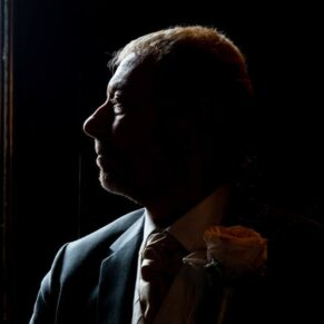 Cliveden House wedding photography - silhouette pose of the groom