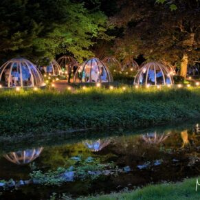 Buckinghamshire events photography of the waterside dining domes at Missenden Abbey