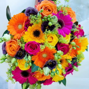 The most colourful summer bouquet for this bride at her woodland marriage