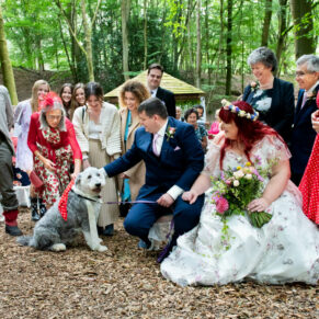 Relaxed family group pose captured just after the woodland civil ceremony