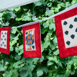 Colourful bunting in the marquee captured at this outdoor Buckinghamshire venue