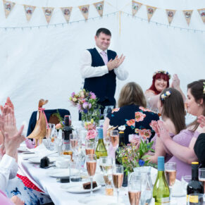 The groom's lively marquee speech in progress with his appreciative audience watching on