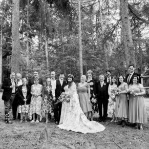Larger family group pose captured amongst the majestic trees at this woodland marriage