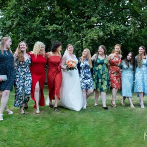 Relaxed walking shot of the bride’s girlfriends at this Mercure Lambert Hotel wedding, Thame