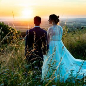 The newlyweds enjoy the sunset at their Mercure Lambert Hotel wedding, Thame