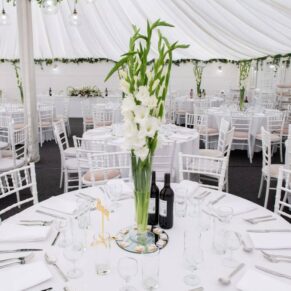 The marquee setup for the wedding breakfast, captured at The Grange, Northwood