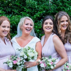 The ladies giggling, captured at The Grange, Northwood wedding