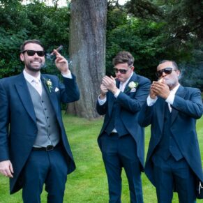 The lads take a cigar break captured at The Grange, Northwood wedding