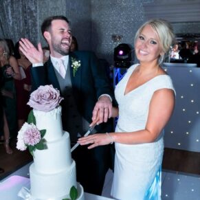 Wedding cake cutting captured at The Grange, Northwood