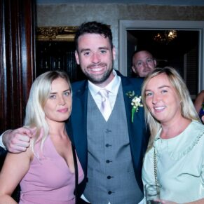 The groom with two friends captured at The Grange, Northwood wedding