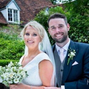 A portrait of the newlyweds captured outdoors at The Grange, Northwood wedding
