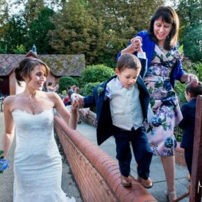 Five Arrows Hotel wedding photography of the pageboys balancing act