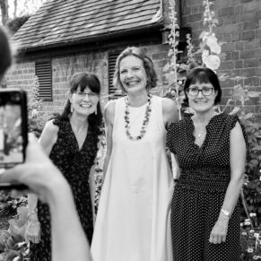 Five Arrows Hotel wedding photography of guests posing for a friend's camera