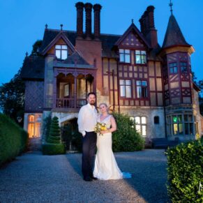 Five Arrows Hotel wedding photography of the bride and groom outside the venue at dusk