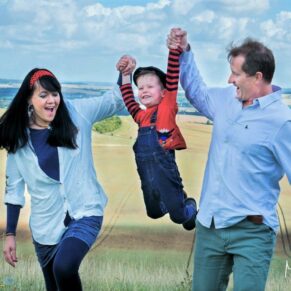 This candid shot of the young lad being swung in the air moment was captured on the Ashridge Estate during a family portrait session