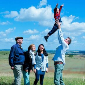 This family pose was captured at Ashridge in Buckinghamshire, the photography session was kept as natural and fun as possible to fit the photography requirements of this customer