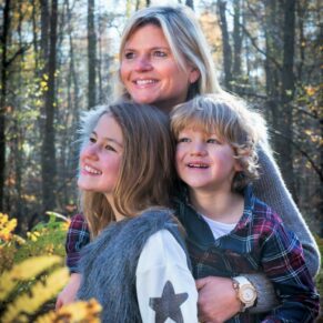Family portraits - Buckinghamshire photography - making a pose as natural as possible always gets great results - this pose captured in a colourful autumnal woodland in the Chilterns