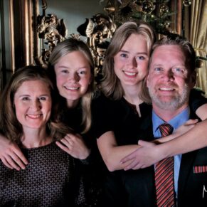 Family portraits - Buckinghamshire photography - making a pose as natural as possible always gets great results - this pose captured in the French Dining Room at Cliveden House