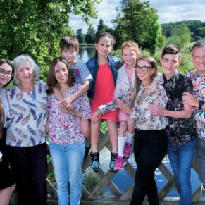 Relaxed family portrait pose in this Buckinghamshire waterside location in the Chess Valley AONB