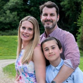 Family portraits - Buckinghamshire photography - a lovely relaxed pose of mum, dad and son