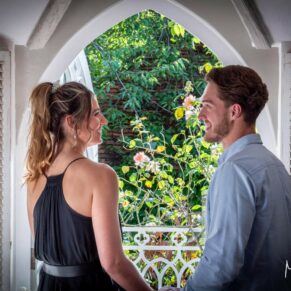 Fun portrait photography of this couple were framed in an arched doorway in a Buckinghamsire setting