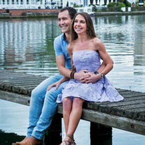 This waterside couple pose was captured by the River Thames in Marlow Buckinghamshire with the Compleat Angler in the distance during their engagement portraits photography session