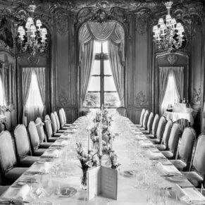 Cliveden House interior of the French Dining Room's long banqueting table all setup for the wedding breakfast
