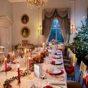 Cliveden House wedding breakfast interior setup of the the Boudoir with dramatic low lighting