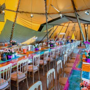 Buckinghamshire Asian Wedding Photography tipi setup showcasing the colourful interiors