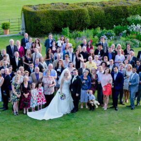 Everyone captured from above in the stunning gardens for this big group pose