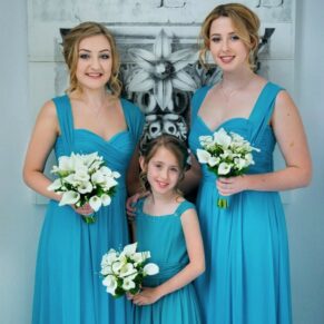 Bridesmaids photography with lovely window lighting captured before the wedding ceremony in the grand historic entrance hall at the Beaumont Estate