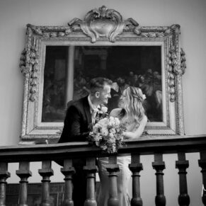 Buckinghamshire Black and White Wedding Photography - the bride and groom pose for my camera at Farnham Castle in Surrey
