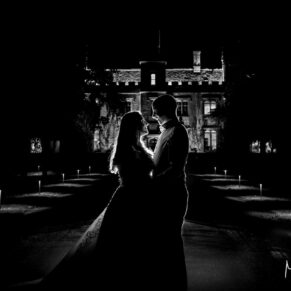 Buckinghamshire Black and White Wedding Photography - dramatic night-time silhouette shot captured at Weston Manor Hotel in Oxfordshire