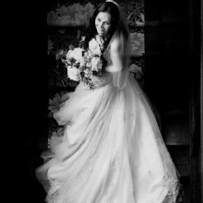 Buckinghamshire Black and White Wedding Photography - bridal portrait captured from above on a grand staircase