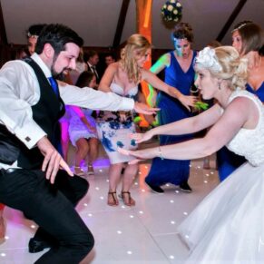 Candid and reportage Buckinghamshire wedding photographer - this bride really knew how to party on the dancefloor
