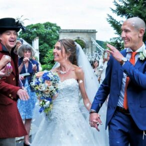 Candid and reportage Buckinghamshire wedding photographer - confetti aisles are always so much fun for everyone involved